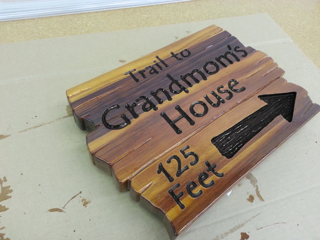 Carved Wooden House Sign
